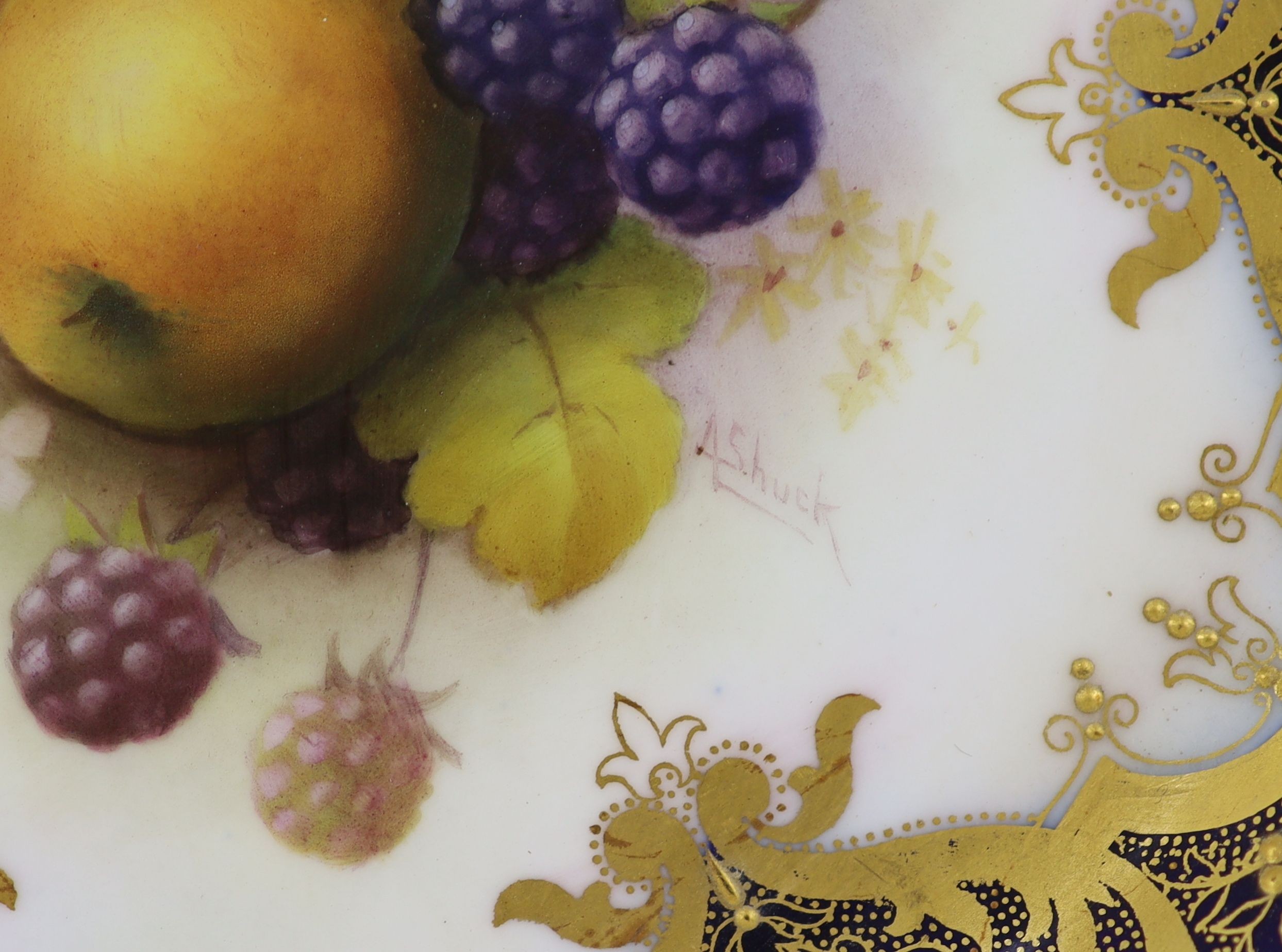 A pair of Royal Worcester fruit painted dessert plates, signed A. Shuck, c.1918, 22.5cm diameter